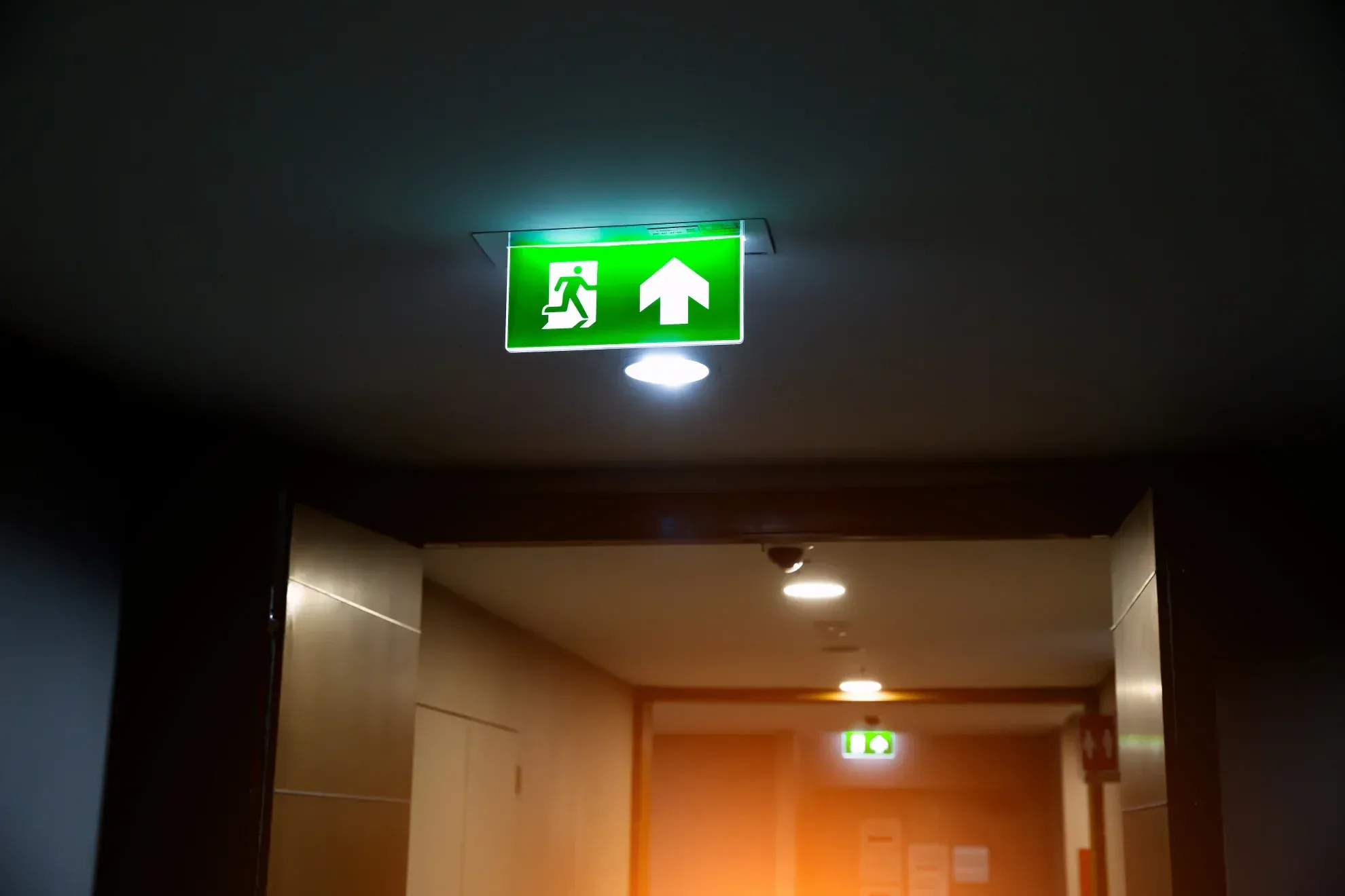 Emergency escape route lighting installed in a commercial corridor by Select Mechanical and Electrical Contractors in Tunbridge Wells